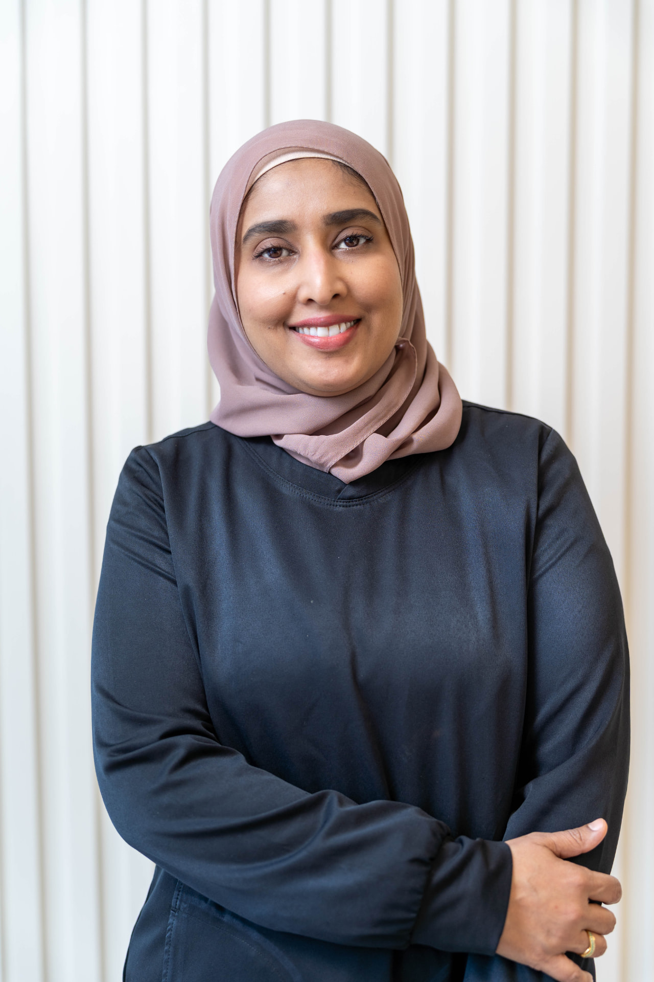 Dr. Faiza